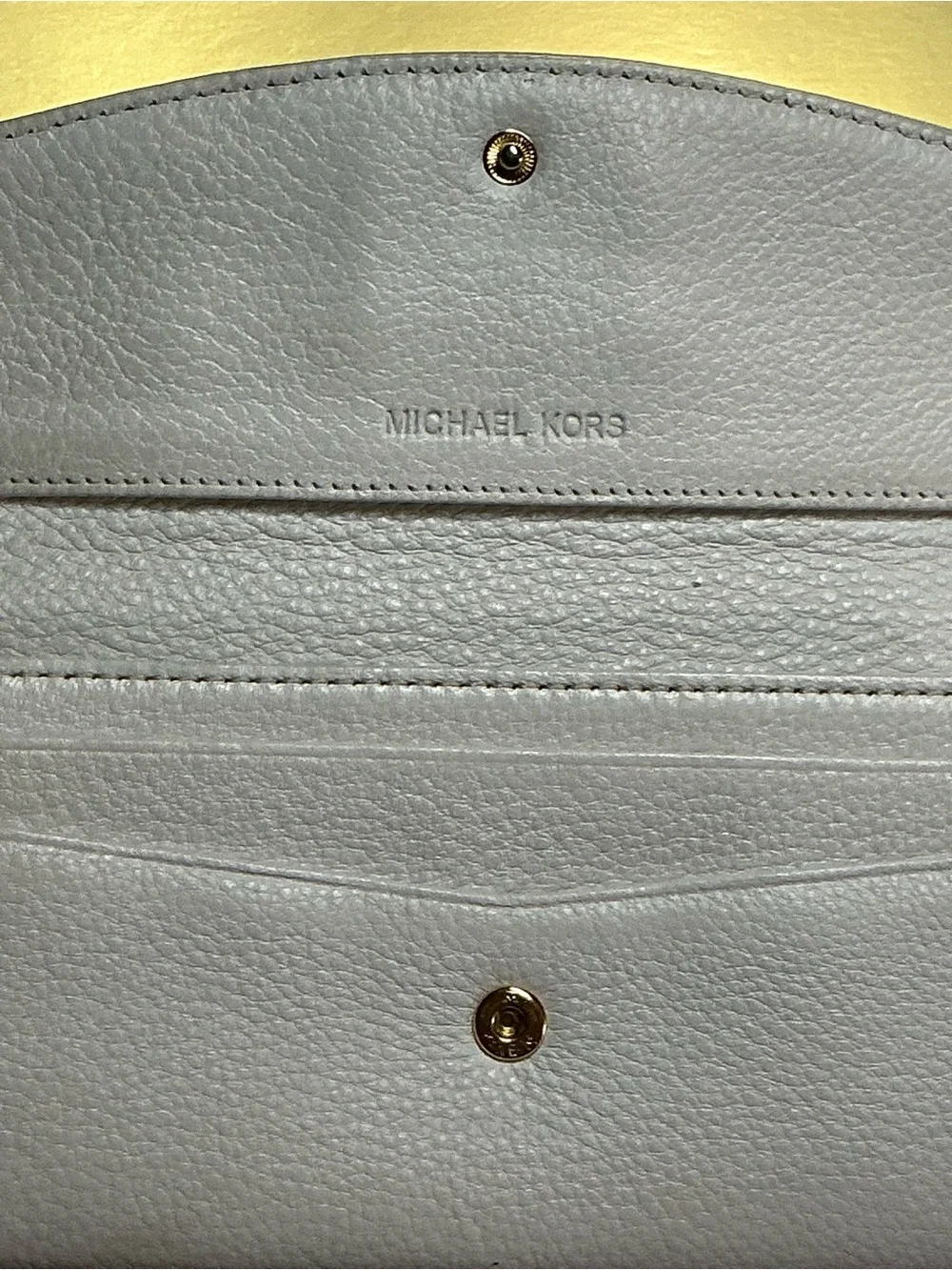 Michael Kors previously owned
